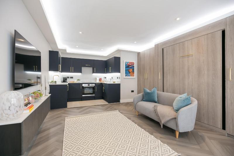 Elegant Studio Retreat in Nevern Square — отель с удобствами в Лондоне