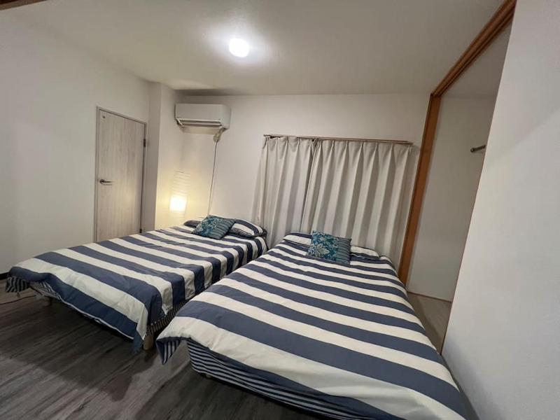 Large two separated rooms in one room — забронировать отель в Осаке