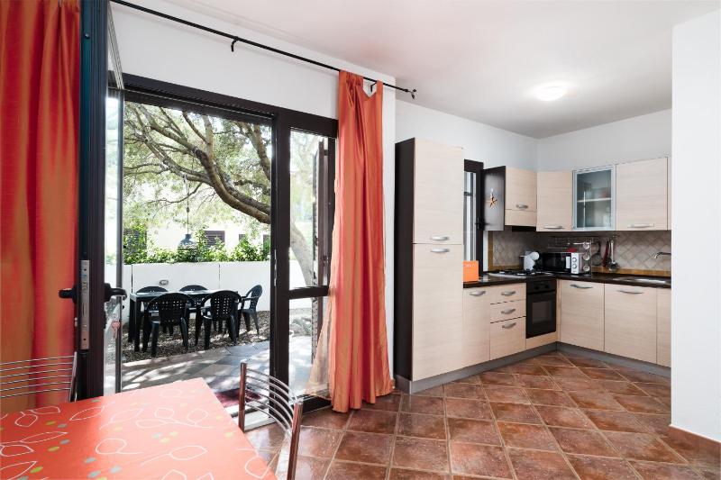 Garden Flat a Orosei - Rilassante appartamento con giardino