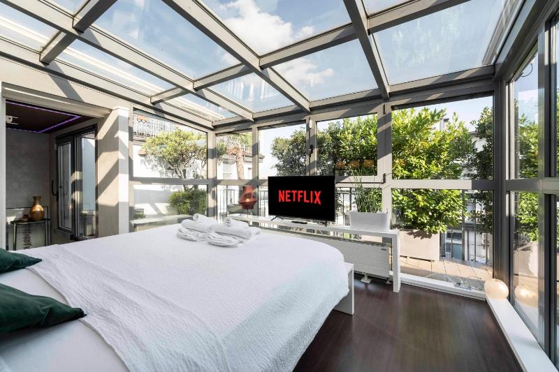 Suite 46 attico con Vista cielo Milano — отель с удобствами в Милане