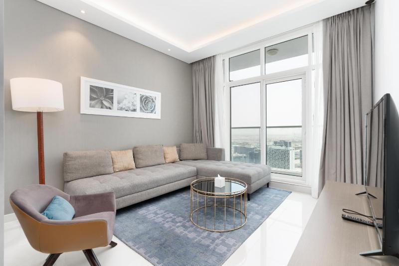 White Sage - Condo With Incredible Canal and Burj Khalifa Views — отель с удобствами в Дубае