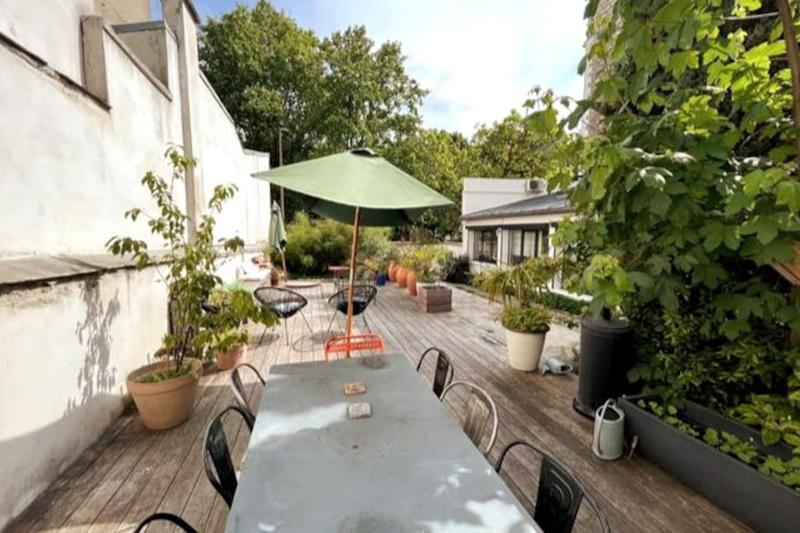 Loft familial avec grand jardin verdoyant — отель с удобным расположением в Париже