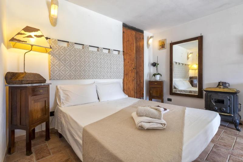 Casa Pergolato a Sorso - Accogliente Oasi con Giardino