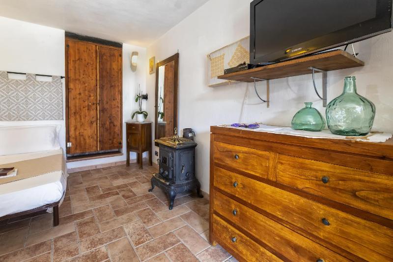 Casa Pergolato a Sorso - Accogliente Oasi con Giardino