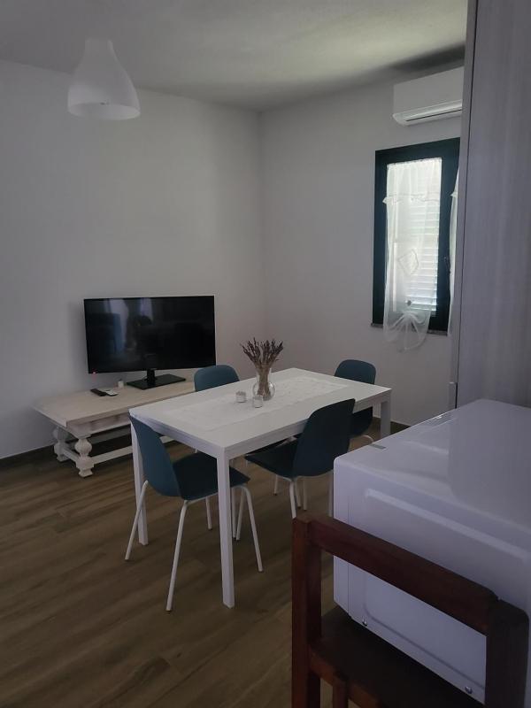 Paule Mare a La Caletta - Incantevole Casa con Giardino