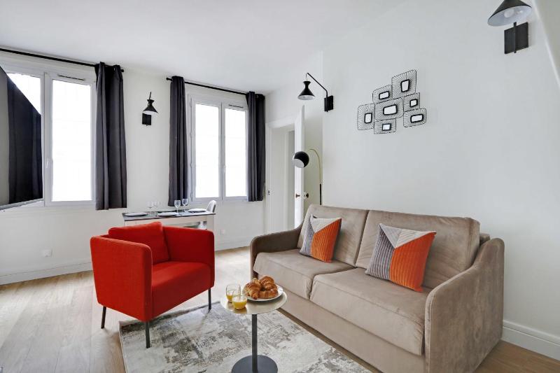 Charming Appartement in Le Marais — отель с удобствами в Париже