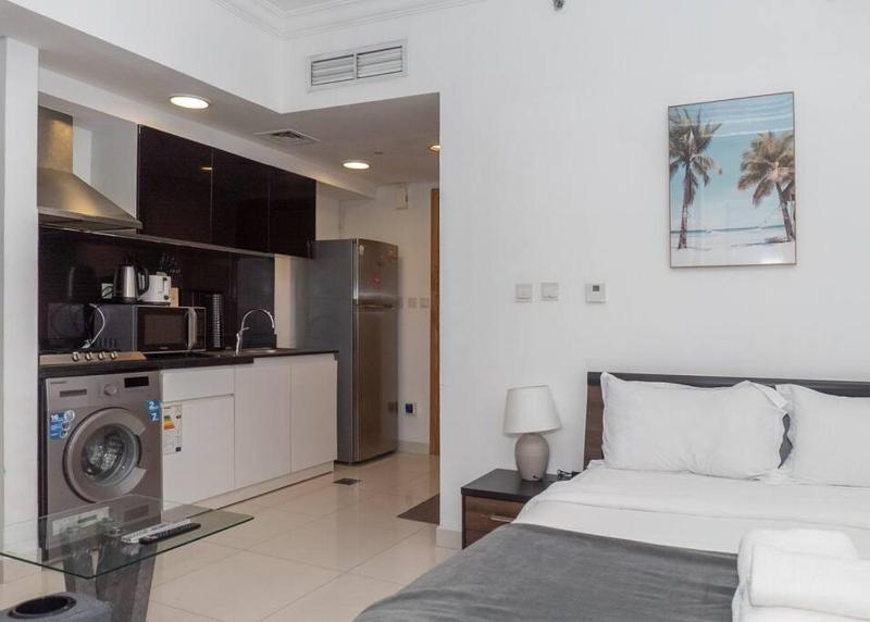 Цены на StoneTree - Cozy Studio Apartment in Business Bay в Дубае