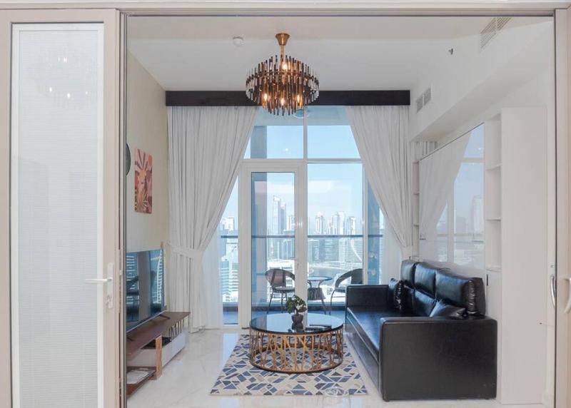StoneTree - Modern 1BR in Business Bay — отель с удобствами в Дубае