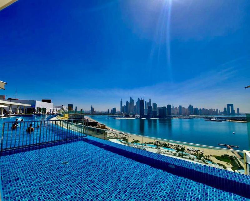 Elegant Palm 1 Bed with Rooftop Infinity Pool — отель с удобствами в Дубае