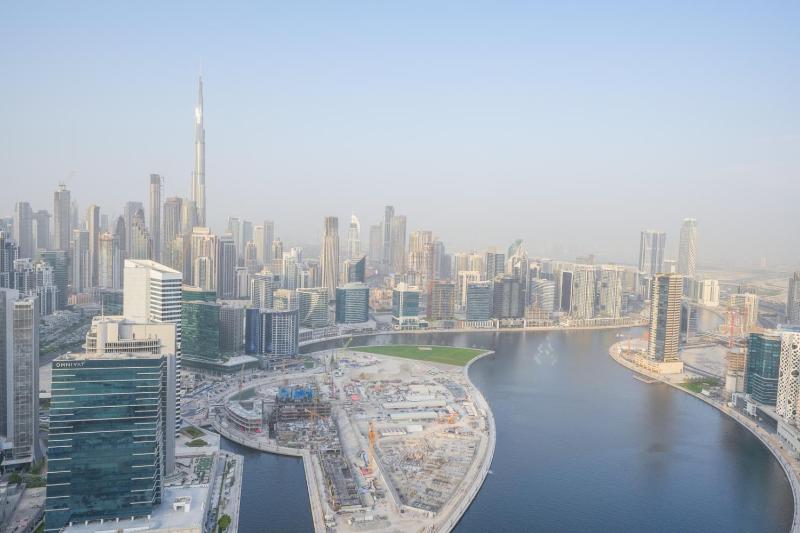 Experience Iconic Burj Khalifa Views from this Apt — отель с удобствами в Дубае