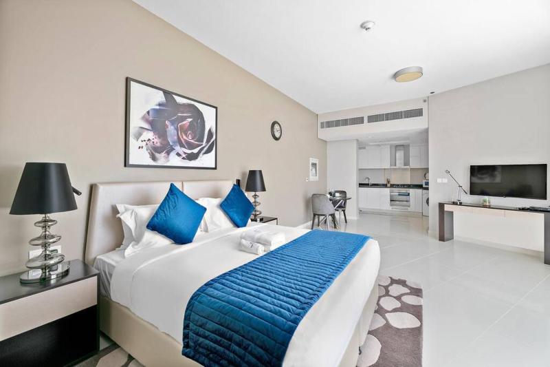 StoneTree - Stylish Studio Apartment in Damac Hills — комфортный отель в Дубае