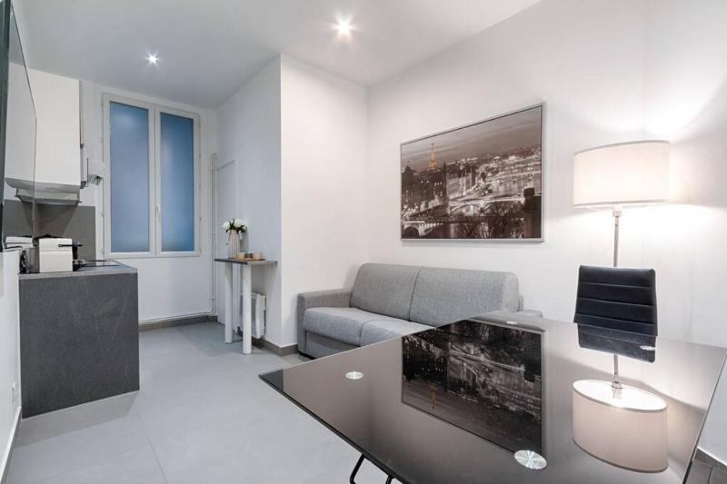 Batignolles Lemercier Cosy Apartment 4P-1BR — отель в Париже, Франция