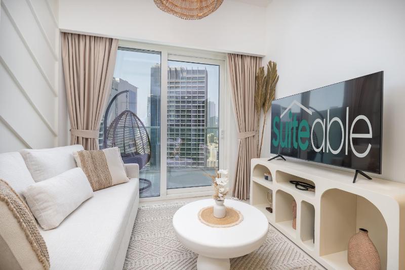 Business Bay Bliss 1 bedroom apartment - Suiteable — отель с удобным расположением в Дубае
