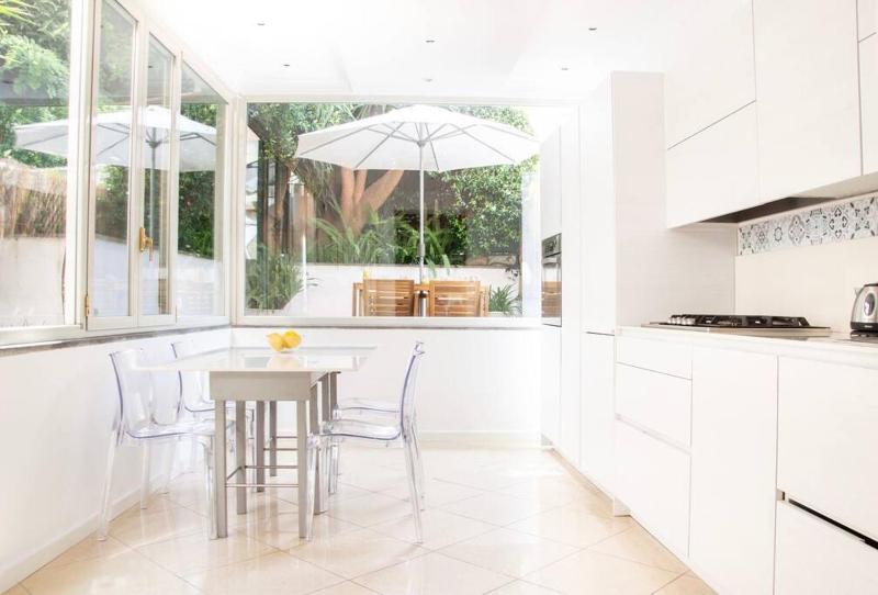 Oasi di relax: appartamento con giardino a Roma — отель с удобствами в Риме