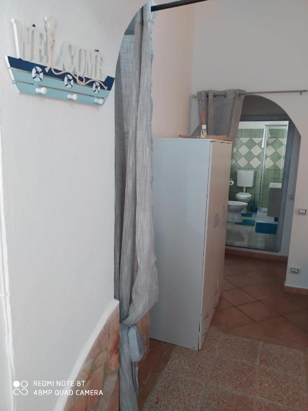 Casa Vacanze da Merlino a Gonnesa - Rifugio con terrazza