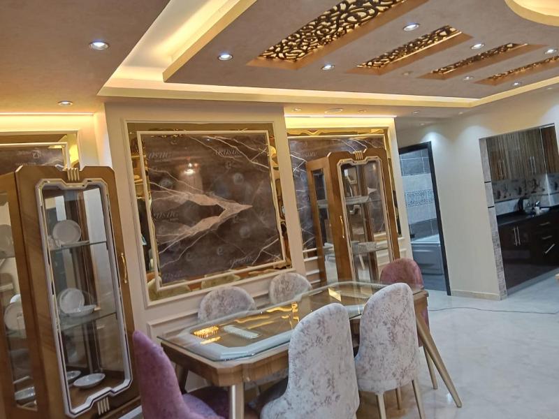 Shqt jdydt swbr lwks jamʿt aldwl almhndsyn Egyptian Nile Cairo royal furnished apartment in muhandessin — отель с удобным расположением в Каире