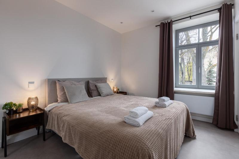 Kipsala apartments with free parking — отель с удобствами в риге