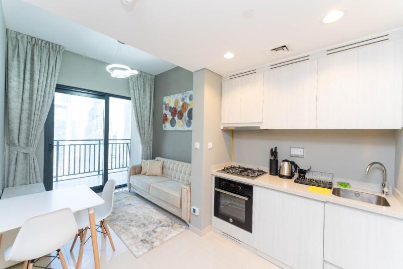 Cozy & Modern 1BR Apartment in Business Bay Walking Distance to the Metro — отель с удобствами в Дубае