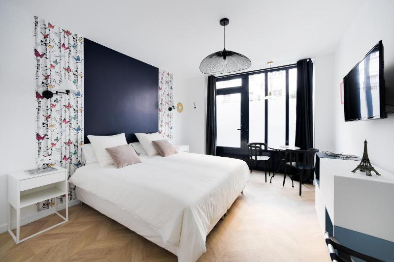 Studio "Cafe Papillon"-Paris 15 — отель в Париже, Франция