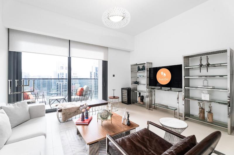 EasyGo - Act 2 Tower 2 Bedroom — отель с удобствами в Дубае