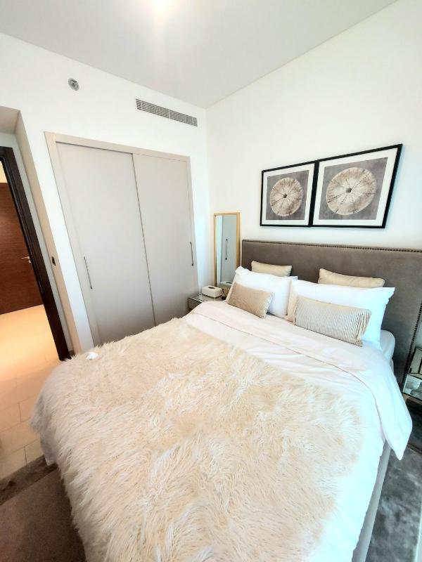 Cozy Relaxing 1 BR 10 min to Dubai Mall — отель с удобствами в Дубае