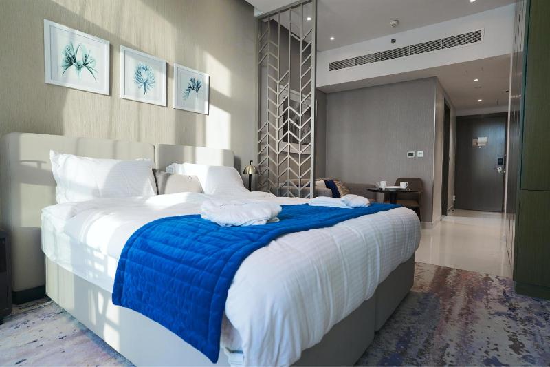 Primestay - Studio Apartment at Maison Prive in Business Bay — отель с удобствами в Дубае