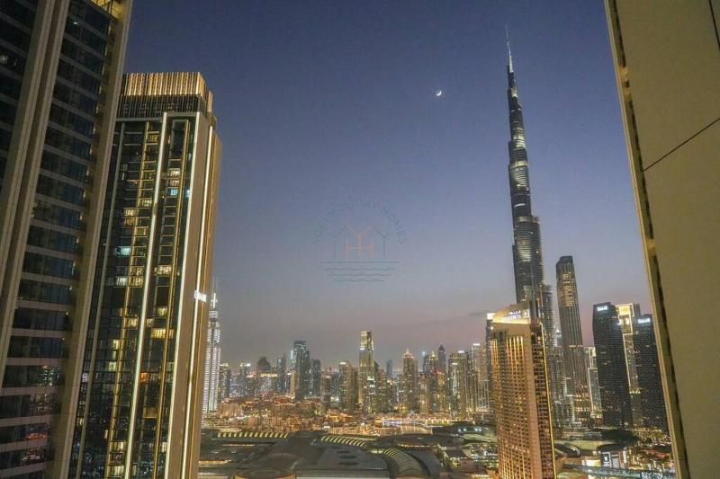 Modern 2BR Apartment with Stunning Dubai Fountain — забронировать отель в Дубае