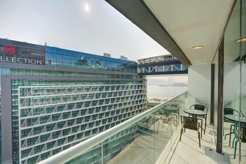 Seven Palm 1 Bed with Rooftop Infinity Pool — забронировать отель в Дубае