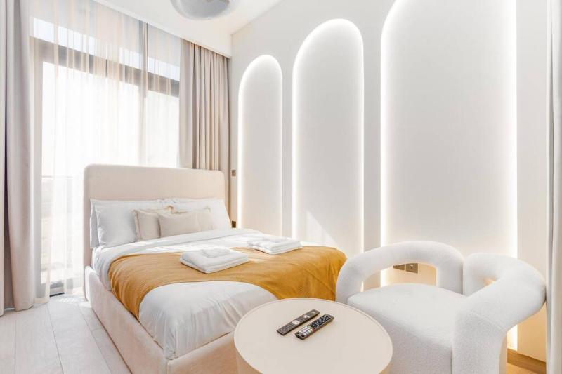 Studio 12min from Burj Khalifa - Azizi Riviera 32 - Dubai — забронировать отель в Дубае