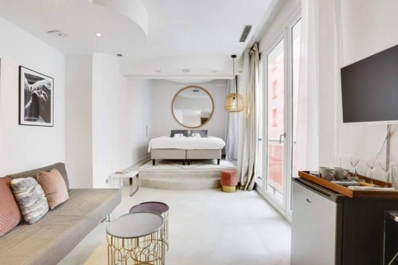 Magnifique appartement parisien - Marais — отель с удобствами в Париже