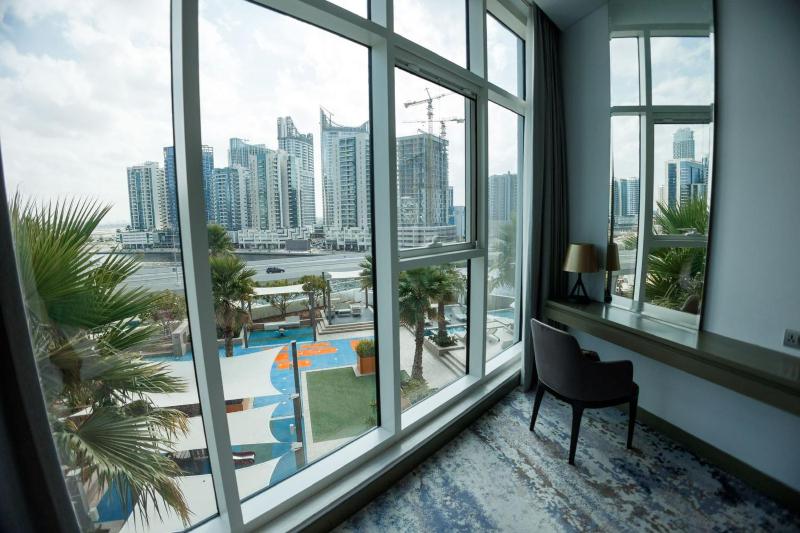 Damac Prive l Canal View l Great Location — отель с удобствами в Дубае