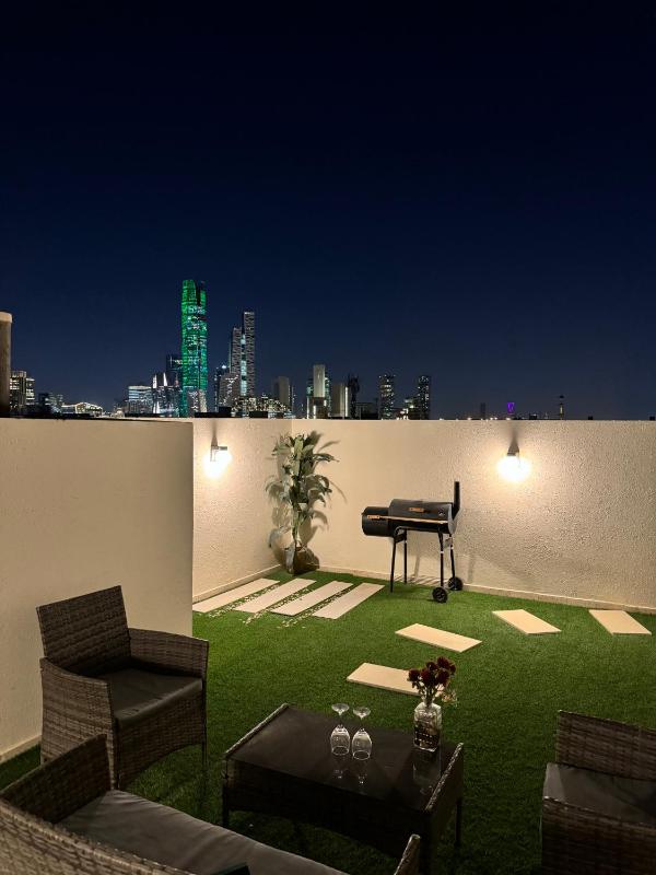 Self Entry Studio with Rooftop with Charming KAFD view — отель с удобствами в Рияде