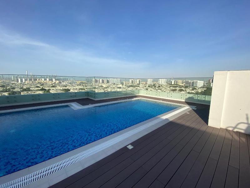 Beautiful studio whit pool rooftop near metro — отель в Дубае, Объединенные Арабские Эмираты