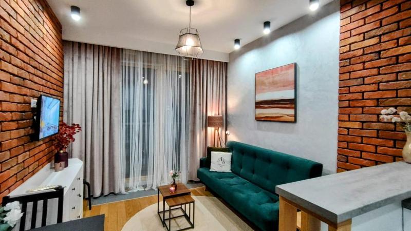 ApartamentySnu, Wola Premium IV z parkingiem — отель с удобным расположением в Варшаве