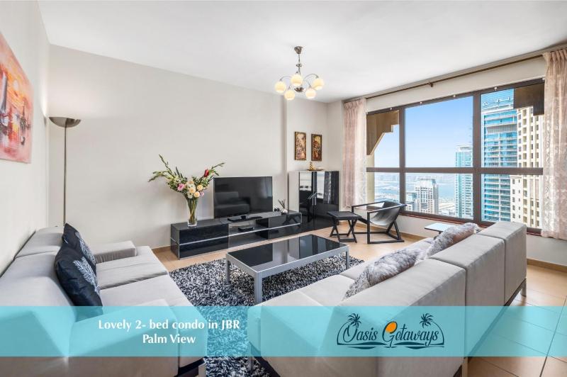 Lovely 2-bed condo in JBR - 5 mins from beach - Palm View! — комфортный отель в Дубае