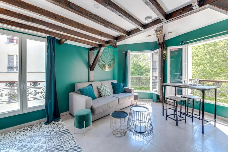147 Suite Atmosphere - Superbe Duplex a Paris — отель с удобствами в Париже