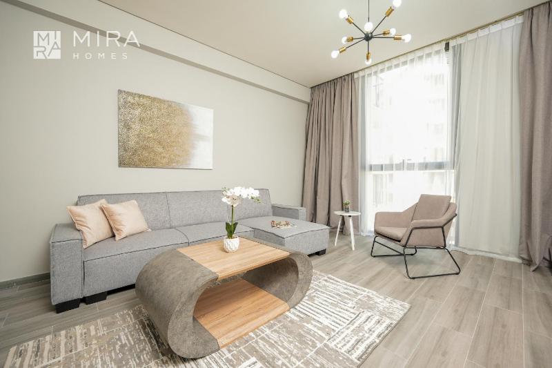 Mira Holiday Homes - Spacious 2 bedroom in Midtown — отель с удобствами в Дубае