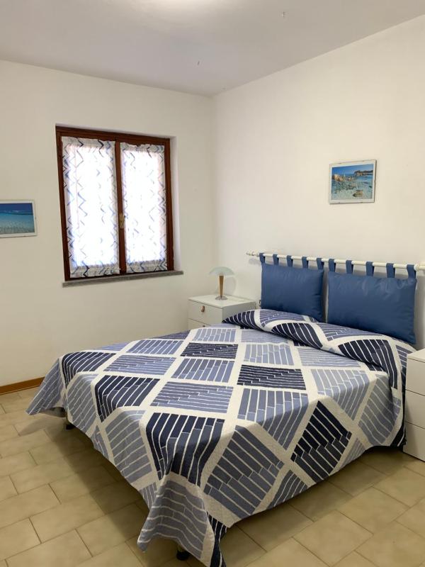 Casa Vacanze a Stintino - Incantevole Giardino sul Mare