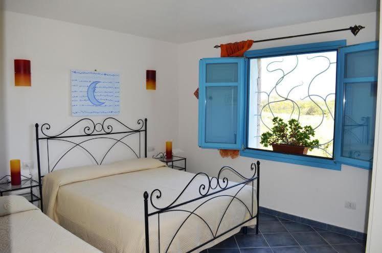 Casa Vacanze Diaz a Budoni - Oasi Fronte Spiaggia