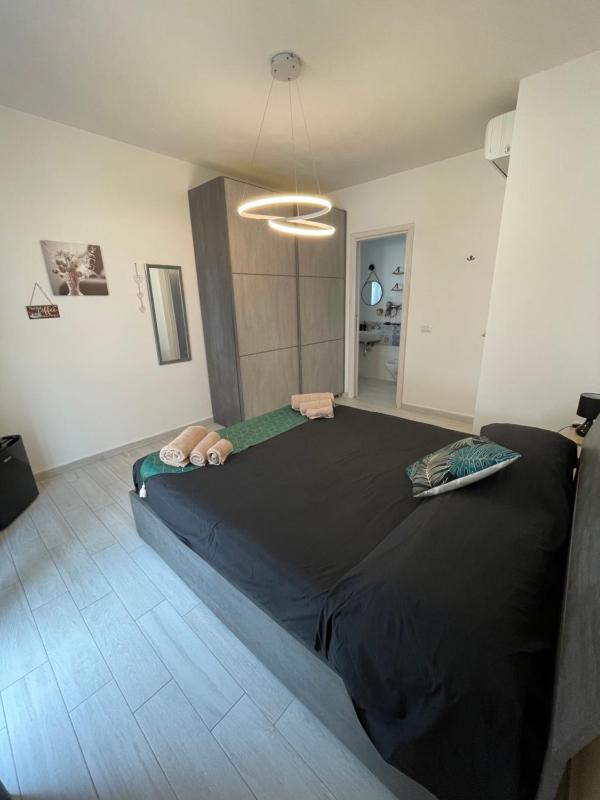 Corte Fiorita a La Caletta - Elegante homestay con colazione