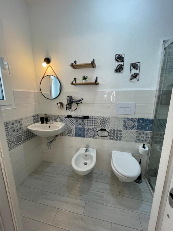 Corte Fiorita a La Caletta - Elegante homestay con colazione