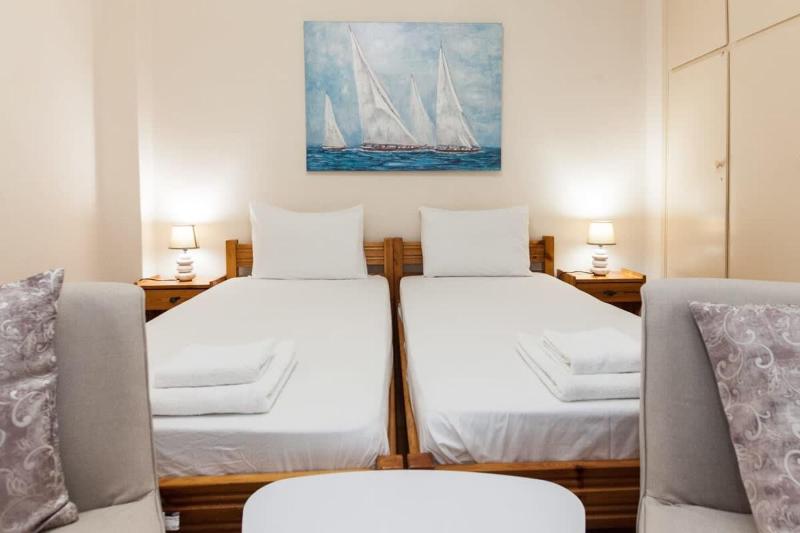 Cozy Cute apt next to Agios Nikolaos — отель в Афины, Греция
