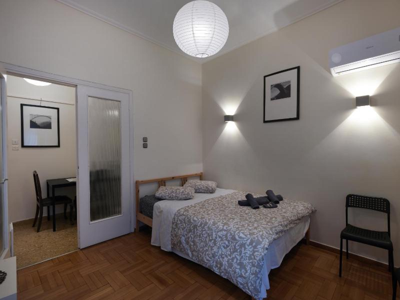 Charming flat in Pagrati 12' from the Panatheinaic Stadium — забронировать отель в Афины