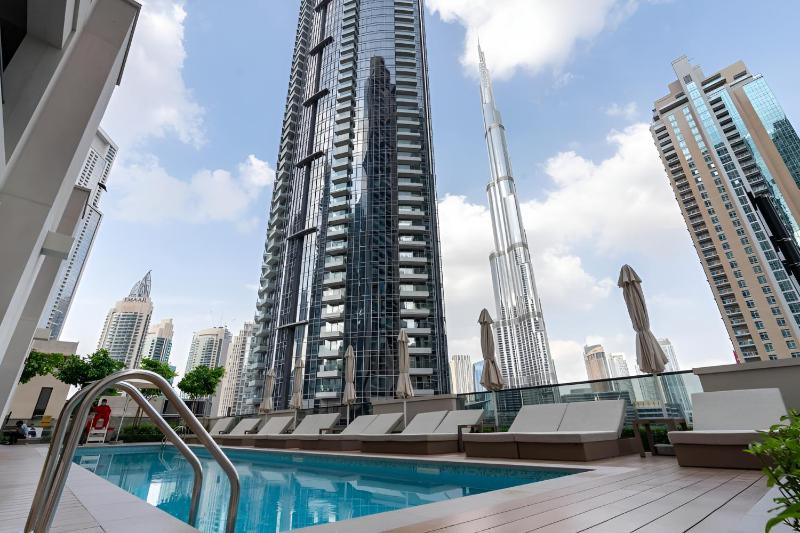 CitiHome-1BR in ACT ONE with Burj Khalifa View at Pool — отель в Дубае, Объединенные Арабские Эмираты