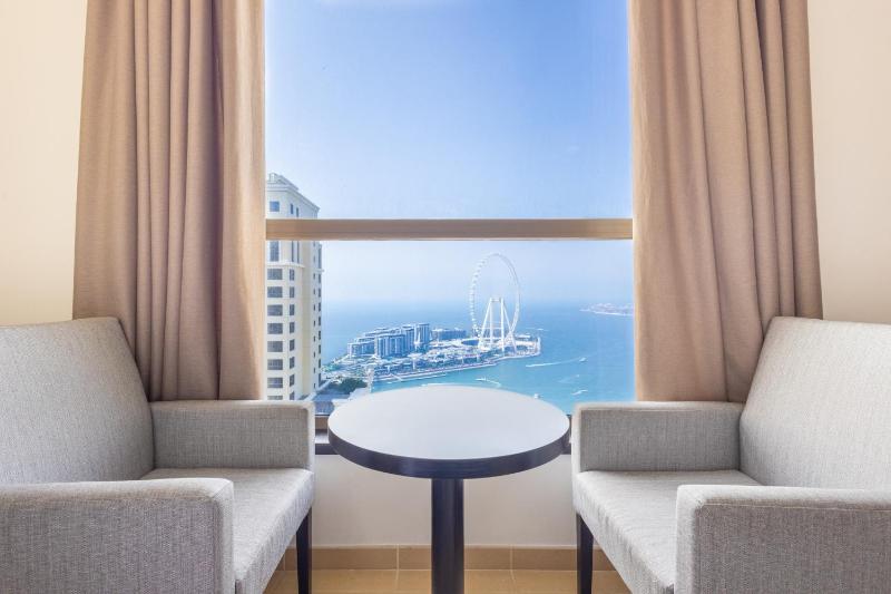 Breathtaking Full Sea view luxury apartment — отель с удобствами в Дубае