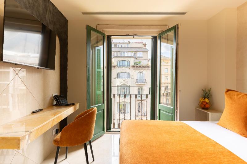 Cosmo Apartments Rambla Catalunya — отель с удобным расположением в Барселоне