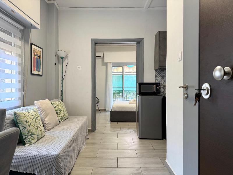 N25 - Cozi Eden 1 bedroom apartment — отель с удобным расположением в Афины