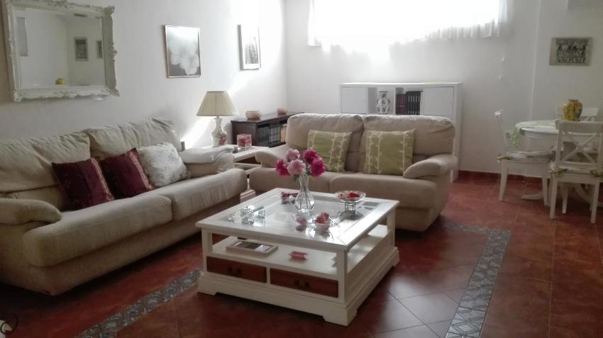 Bright apartment with bedroom, living room and private bathroom by the sea.