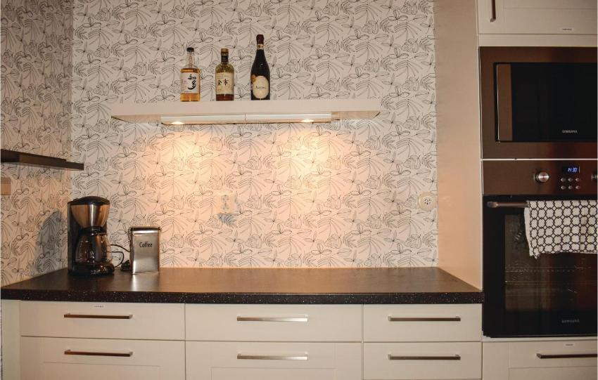 Amazing home in Haverdal with 4 Bedrooms and WiFi