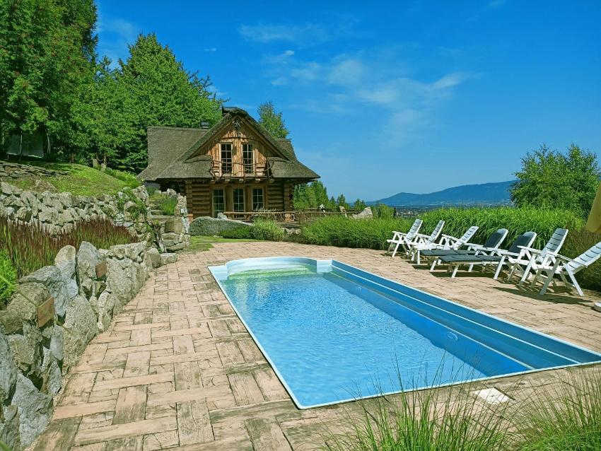 Wooden holiday home in Lipowa with bubble bath